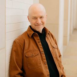 Headshot of Greg Adams.