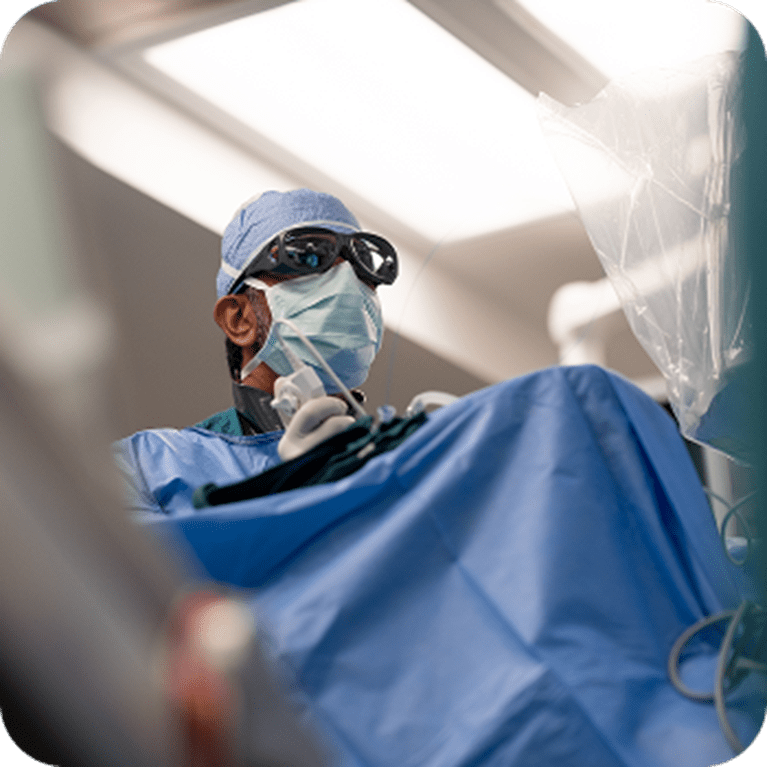 Doctor performing kidney stone procedure.