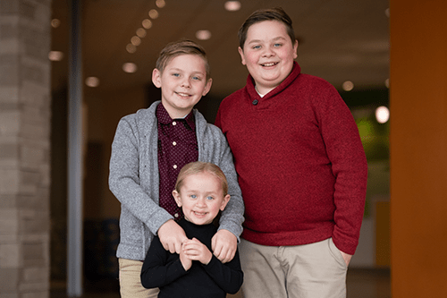 Girl and two boys